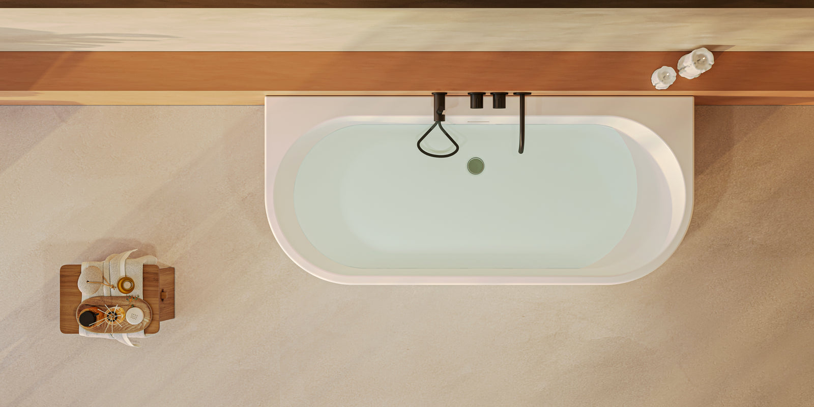Detalle del desagüe central oculto en bronce cepillado de la bañera PALOMA
